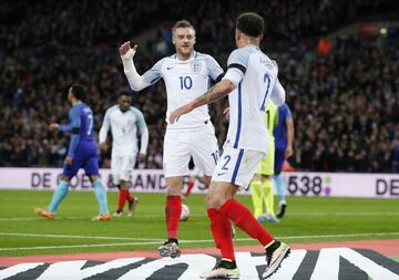 Jamie Vardy celebrates with Kyle Walker after opening the scoring in England's defeat at Wembley on Tuesday.