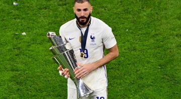 France's Karim Benzema celebrates with the trophy after Les Bleus won the 2020/21 Nations League.