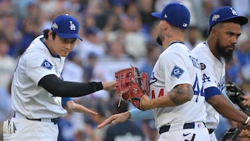 Oct 16, 2025; Los Angeles, California, USA; Los Angeles Dodgers designated hitter Shohei Ohtani (17) congratulates center fielder Andy Pages (44) after the final out of the ninth inning of game three of the NLCS during the 2025 MLB playoffs against the Milwaukee Brewers at Dodger Stadium. Mandatory Credit: Jayne Kamin-Oncea-Imagn Images