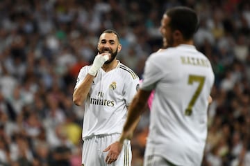 Real Madrid's French forward Karim Benzema reacts during the UEFA Champions league Group A football match between Real Madrid and Club Brugge at the Santiago Bernabeu stadium in Madrid on October 1, 2019. 