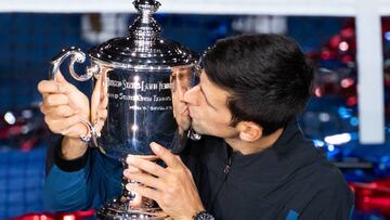Novak Djokovic of Serbia kisses the trophy to celebrate his win in 3 sets against Juan Martin del Potro of Argentina in the Men&#039;s Final in Arthur Ashe Stadium at the 2018 US Open Tennis Championships at the USTA Billie Jean King National Tennis Cente