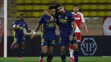 Soccer Football - Ligue 1 - AS Monaco v Olympique Lyonnais - Stade Louis II, Monaco - May 2, 2021 Olympique Lyonnais' Memphis Depay celebrates scoring their first goal with teammates REUTERS/Eric Gaillard