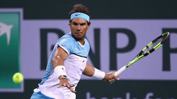 Rafael Nadal in action against Gilles Muller. 