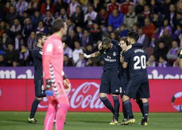 Real Madrid's players celebrate their fourth goal against Real Valladolid, scored by Luka Modric (second right).