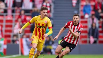 BILBAO, SPAIN - FEBRUARY 26: Rodrigo Riquelme of Girona FC compete for the ball with Oscar de Marcos of Athletic Club during the LaLiga Santander match between Athletic Club and Girona FC at San Mames Stadium on February 26, 2023 in Bilbao, Spain. (Photo by Ion Alcoba/Quality Sport Images/Getty Images)