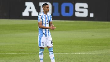 AVELLANEDA, ARGENTINA - NOVEMBER 28: Santiago Godoy of Racing Club stands in front of a sign that reads 'AD10S' in tribute to during a minute the late football legend Diego Maradona
before a match between Racing Club and Union as part of Copa