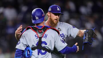 NEW YORK, NEW YORK - OCTOBER 28: Michael Kopech #45 and Will Smith #16 of the Los Angeles Dodgers embrace after their 4-2 win over the New York Yankees during Game Three of the 2024 World Series at Yankee Stadium on October 28, 2024 in the Bronx borough of New York City. Alex Slitz/Getty Images/AFP (Photo by Alex Slitz / GETTY IMAGES NORTH AMERICA / Getty Images via AFP)