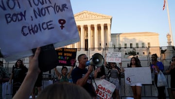 Abortion rights demonstrators protest the day after the United States Supreme Court ruled in the Dobbs v Women's Health Organization abortion case, overturning the landmark Roe v Wade abortion decision.