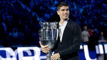 TURIN, ITALY - NOVEMBER 16:  Carlos Alcaraz of Spain walks off the court after receiving the ATP Year End Number One Trophy presented to him during day four of the Nitto ATP Finals at Pala Alpitour on November 16, 2022 in Turin, Italy. (Photo by Matthew Stockman/Getty Images)