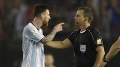 Argentina&#039;s forward Lionel Messi (L) argues with first assistant referee Emerson Augusto de Carvalho at the end of their 2018 FIFA World Cup Russia South American qualifier football match against Chile, at the Monumental stadium in Buenos Aires, on March 23, 2017. 
 The FIFA on March 28, 2017 suspended Messi for four Argentina games. / AFP PHOTO / JUAN MABROMATA