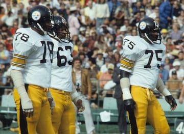 Dwight White, Ernie Holmes y Joe Greene. Tres de los cuatro integrantes del Telón de Acero de los Steelers.