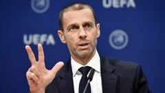 UEFA president Aleksander Ceferin gestures during a press conference following a meeting of the executive committee at the UEFA headquarters, in Nyon, Switzerland on December 4, 2019. (Photo by Fabrice COFFRINI / AFP)