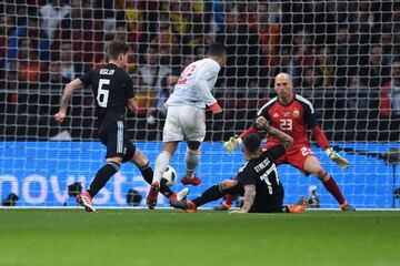 Spain's midfielder Thiago Alcantara scores their fourth goal. 4-1