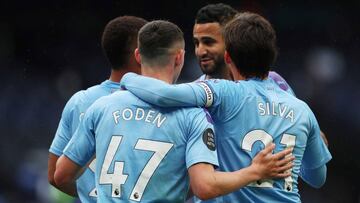 FILE PHOTO: Soccer Football - Premier League - Manchester City v Newcastle United - Etihad Stadium, Manchester, Britain - July 8, 2020  Manchester City&#039;s Riyad Mahrez celebrates scoring their second goal with teammates, as play resumes behind closed 