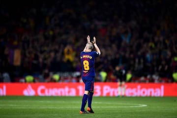 Iniesta applauds the Barcelona fans as he is taken off to a standing ovation during Saturday's Copa del Rey final.