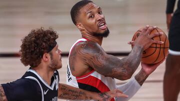 Kissimmee (United States), 14/08/2020.- Portland Trail Blazers guard Damian Lillard (R) in action against Brooklyn Nets guard Tyler Johnson (L) during the first half of the NBA basketball game between the Portland Trail Blazers and the Brooklyn Nets at the ESPN Wide World of Sports Complex in Kissimmee, Florida, USA, 13 August 2020. (Baloncesto, Estados Unidos) EFE/EPA/ERIK S. LESSER SHUTTERSTOCK OUT