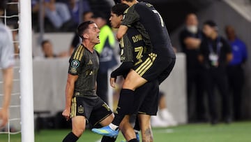 LOS ANGELES, CALIFORNIA - APRIL 7: David Mart�nez #30 of Los Angeles Football Club is congratulated by Son Heung-Min #7 and Sergi Palencia #14 after scoring a goal against Cruz Azul during the first half of the CONCACAF Champions Cup 2026 Quarter-Final First Leg match at Banc of California Stadium on April 7, 2026 in Los Angeles, California. Kevork Djansezian/Getty Images/AFP (Photo by KEVORK DJANSEZIAN / GETTY IMAGES NORTH AMERICA / Getty Images via AFP)