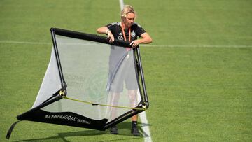 13 July 2022, Great Britain, London: Soccer: national team, women, EM 2022, training Germany: Germany's national coach Martina Voss-Tecklenburg carries a goal. Photo: Sebastian Gollnow/dpa (Photo by Sebastian Gollnow/picture alliance via Getty Images)