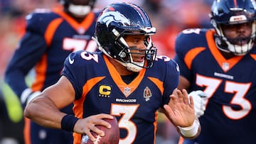 DENVER, COLORADO - DECEMBER 11: Russell Wilson #3 of the Denver Broncos looks to throw the ball during the first half against the Kansas City Chiefs at Empower Field At Mile High on December 11, 2022 in Denver, Colorado. Jamie Schwaberow/Getty Images/AFP (Photo by Jamie Schwaberow / GETTY IMAGES NORTH AMERICA / Getty Images via AFP)