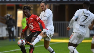 Rennes&#039; French midfielder Eduardo Camavinga (L) fights for the ball with Lille&#039;s Turkish midfielder Yusuf Yazici during the French L1 football match between Stade Rennais and Lille (Losc) at the Roazhon Park Stadium in Rennes, western France, on