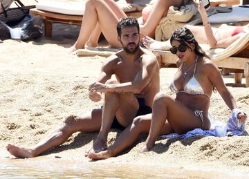 Cesc Fàbregas and Daniella Seman chill out on the beach as part of their holiday with the family in Sardinia.