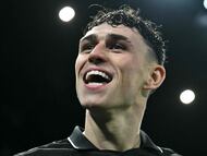 Manchester City's English midfielder #47 Phil Foden celebrates scoring the team's fourth goal during the English Premier League football match between Fulham and Manchester City at Craven Cottage in London on December 2, 2025. (Photo by Ben STANSALL / AFP) / RESTRICTED TO EDITORIAL USE. No use with unauthorized audio, video, data, fixture lists, club/league logos or 'live' services. Online in-match use limited to 120 images. An additional 40 images may be used in extra time. No video emulation. Social media in-match use limited to 120 images. An additional 40 images may be used in extra time. No use in betting publications, games or single club/league/player publications. /
