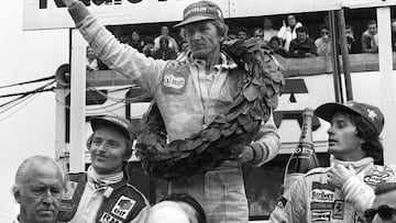 (FILES) In this file photo taken on July 1, 1979 French driver Jean-Pierre Jabouille (C) celebrates next to (L) third-placed Rene Arnoux (L) and second-placed Gilles Villeneuve (R) after winning the Grand Prix de France in Dijon.  / AFP PHOTO / DANIEL JANIN