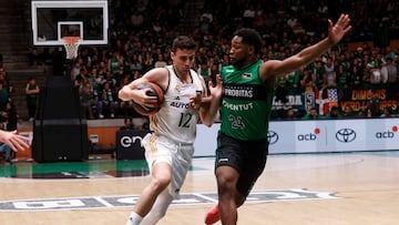 Carlos Aloc¨¦n, base del Real Madrid, frente a Andr¨¦s Feliz, del Joventut.
