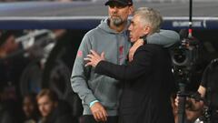 MADRID, SPAIN - MARCH 15:  Liverpool Manager Jurgen Klopp & Real Madrid Head Coach / Manager Carlo Ancelotti react during the UEFA Champions League round of 16 leg two match between Real Madrid and Liverpool FC at Estadio Santiago Bernabeu on March 15, 2023 in Madrid, Spain. (Photo by Chris Brunskill/Fantasista/Getty Images)