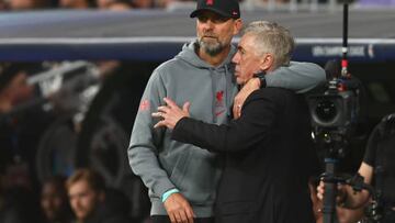 MADRID, SPAIN - MARCH 15: Liverpool Manager Jurgen Klopp & Real Madrid Head Coach / Manager Carlo Ancelotti react during the UEFA Champions League round of 16 leg two match between Real Madrid and Liverpool FC at Estadio Santiago Bernabeu on March 15, 2023 in Madrid, Spain. (Photo by Chris Brunskill/Fantasista/Getty Images)