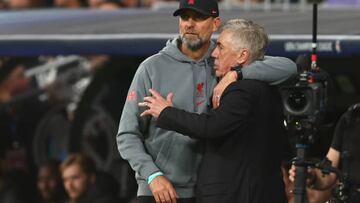 MADRID, SPAIN - MARCH 15:  Liverpool Manager Jurgen Klopp & Real Madrid Head Coach / Manager Carlo Ancelotti react during the UEFA Champions League round of 16 leg two match between Real Madrid and Liverpool FC at Estadio Santiago Bernabeu on March 15, 2023 in Madrid, Spain. (Photo by Chris Brunskill/Fantasista/Getty Images)