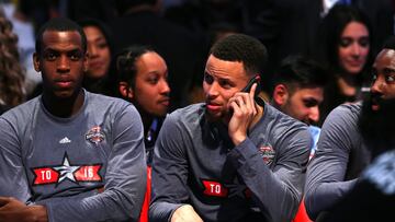 Khris Middleton y Stephen Curry -