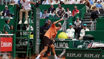 Russia's Daniil Medvedev smashes his racket on the clay as he plays against Italy's Matteo Berrettini during the Monte Carlo ATP Masters Series Tournament round of 32 tennis match on Court Rainier III at the Monte-Carlo Country Club in Roquebrune-Cap-Martin, south-eastern France on April 8, 2026. (Photo by Valery HACHE / AFP)