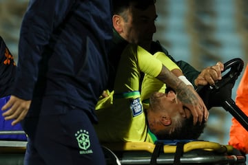 Neymar is stretchered off after tearing his ACL in Brazil's 2026 World Cup qualifier against Uruguay in October 2023. 