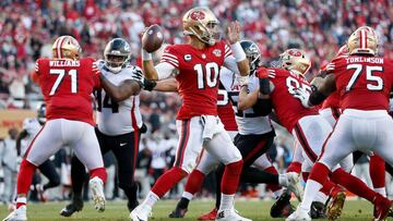 SANTA CLARA, CALIFORNIA - DECEMBER 19: Jimmy Garoppolo #10 of the San Francisco 49ers looks to a pass during the second half of the game against the Atlanta Falcons at Levi&#039;s Stadium on December 19, 2021 in Santa Clara, California.   Lachlan Cunningh
