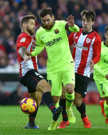 Old foes | Barcelona's Argentinian forward Lionel Messi vies with Athletic Bilbao's Spanish defender Inigo Martinez.