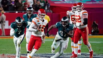 Kansas City Chiefs' quarterback Patrick Mahomes runs with the ball during Super Bowl LVII between the Kansas City Chiefs and the Philadelphia Eagles at State Farm Stadium in Glendale, Arizona, on February 12, 2023. (Photo by TIMOTHY A. CLARY / AFP)