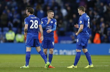 Leicester City's Jamie Vardy, Robert Huth and Christian Fuchs celebrate after the Hull City game