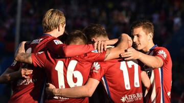 Group hug after Angel Correa makes it 3-0.