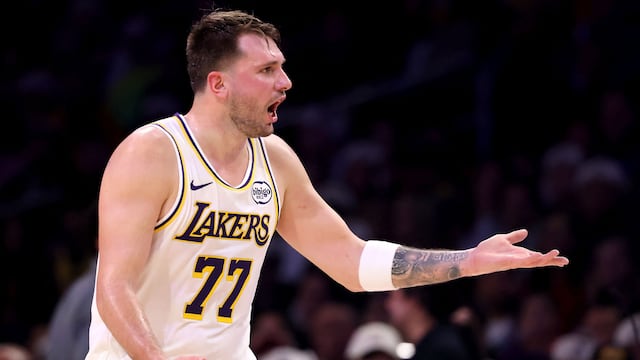LOS ANGELES, CALIFORNIA - DECEMBER 25: Luka Doncic #77 of the Los Angeles Lakers reacts to a play during the first quarter against the Houston Rockets at Crypto.com Arena on December 25, 2025 in Los Angeles, California. NOTE TO USER: User expressly acknowledges and agrees that, by downloading and or using this photograph, User is consenting to the terms and conditions of the Getty Images License Agreement. Katelyn Mulcahy/Getty Images/AFP (Photo by Katelyn Mulcahy / GETTY IMAGES NORTH AMERICA / Getty Images via AFP)