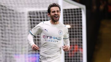 WATFORD, ENGLAND - DECEMBER 04: Bernardo Silva of Manchester City celebrates after scoring their side&#039;s third goal  during the Premier League match between Watford and Manchester City at Vicarage Road on December 04, 2021 in Watford, England. (Photo 