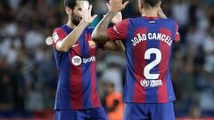 BARCELONA , 23/09/2023.- l defensa portugués del FC Barcelona Joao Cancelo (d) celebra con el centrocampista del FC Barcelona Ilkay Gündogan (i) al término del encuentro de la jornada 6 de LaLiga entre FC Barcelona y RC Celta de Vigo, este sábado en el Estadio Olímpico de Montjuic, en Barcelona. EFE/ Quique García
