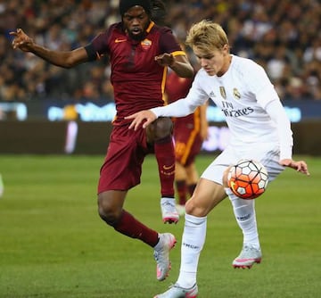 Odegaard in action for Real's seniors against Roma in summer 2015.