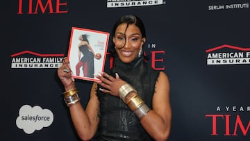 A'ja Wilson poses holding a copy of the TIME Magazine naming her Athlete of the Year on the red carpet for TIME's "A Year in TIME" event in New York City, U.S., December 10, 2025. REUTERS/Kylie Coope
