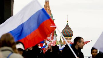 MOSCOW, RUSSIA - SEPTEMBER 23: Russians hold a rally in support of separatist regions in Ukraine at Manege Square in Moscow, Russia on September 23, 2022. Protesters carrying Russian flags chanted support slogans for the Donbas, Zaporozhye and Kherson regions. Ministry of Internal Affairs of Russia announced that about 50,000 people attended the demonstration. (Photo by Sefa Karacan/Anadolu Agency via Getty Images)