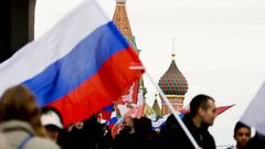 MOSCOW, RUSSIA - SEPTEMBER 23: Russians hold a rally in support of separatist regions in Ukraine at Manege Square in Moscow, Russia on September 23, 2022. Protesters carrying Russian flags chanted support slogans for the Donbas, Zaporozhye and Kherson regions. Ministry of Internal Affairs of Russia announced that about 50,000 people attended the demonstration. (Photo by Sefa Karacan/Anadolu Agency via Getty Images)