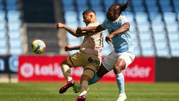 VIGO, SPAIN - APRIL 02:  Joseph Aidoo of RC Celta de Vigo competes for the ball with Luis Suarez of UD Almeria during the LaLiga Santander match between RC Celta and UD Almeria at Estadio Balaidos on April 02, 2023 in Vigo, Spain. (Photo by Jose Manuel Alvarez/Quality Sport Images/Getty Images)