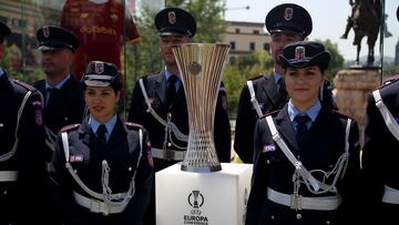 Tirana (Albania), 24/05/2022.- Municipality police pose next to the UEFA Conference League trophy on display in Skanderbeg Square in Tirana, Albania, 24 May 2022. Feyenoord Rotterdam will face AS Roma in their UEFA Europa Conference League final on 25 May 2022. EFE/EPA/MALTON DIBRA
