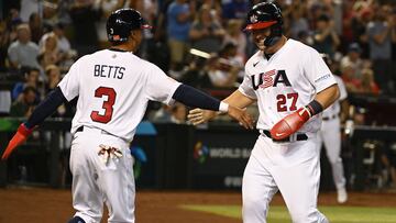 PHOENIX, ARIZONA - MARCH 13: Mike Trout #27 of the United States celebrates with Mookie Betts #3 after scoring on a double by Nolan Arenado against Canada during the first inning of a World Baseball Classic Pool C game at Chase Field on March 13, 2023 in Phoenix, Arizona.   Norm Hall/Getty Images/AFP (Photo by Norm Hall / GETTY IMAGES NORTH AMERICA / Getty Images via AFP)