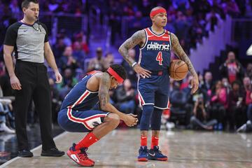 Isaiah Thomas y Bradley Beal. 